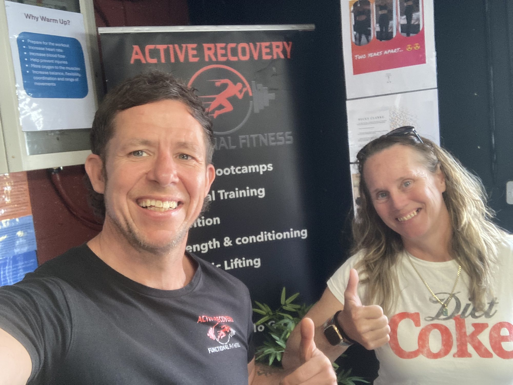 Ben with a member at the gym