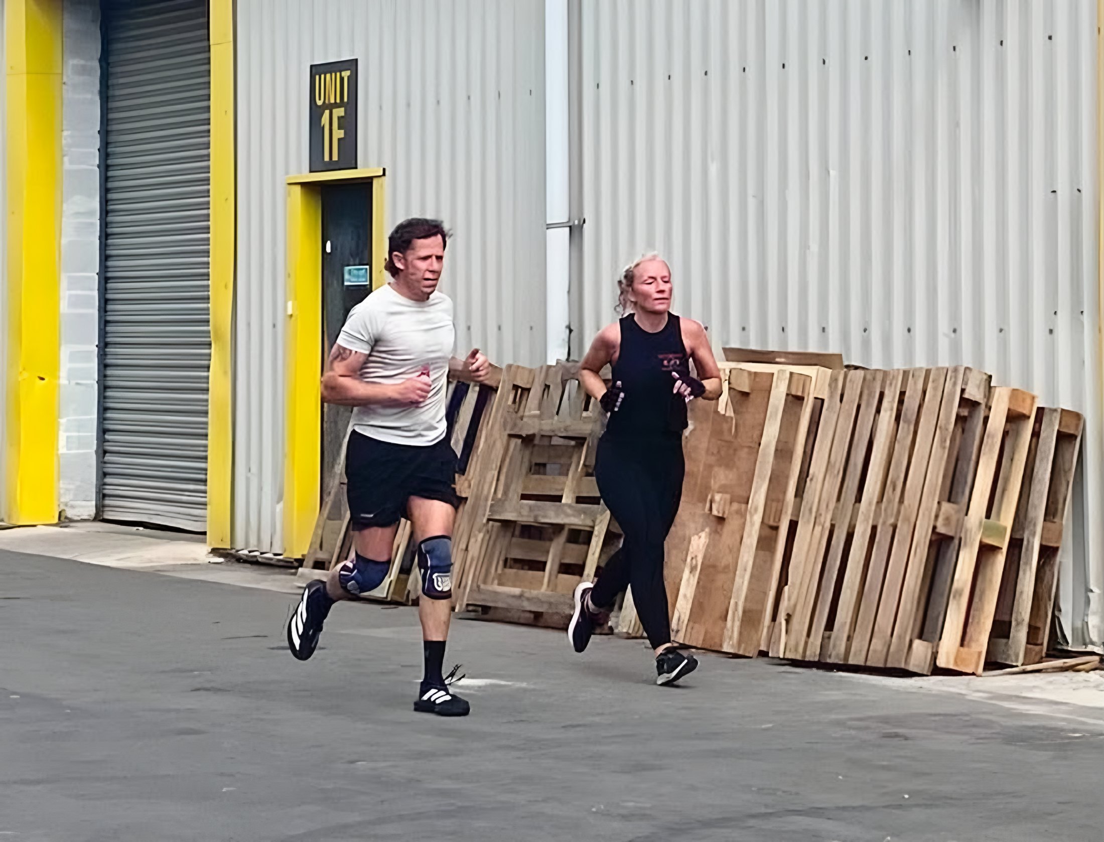 Members running outside the gym